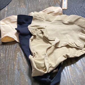 Skims mid waist sculpting thong in onyx